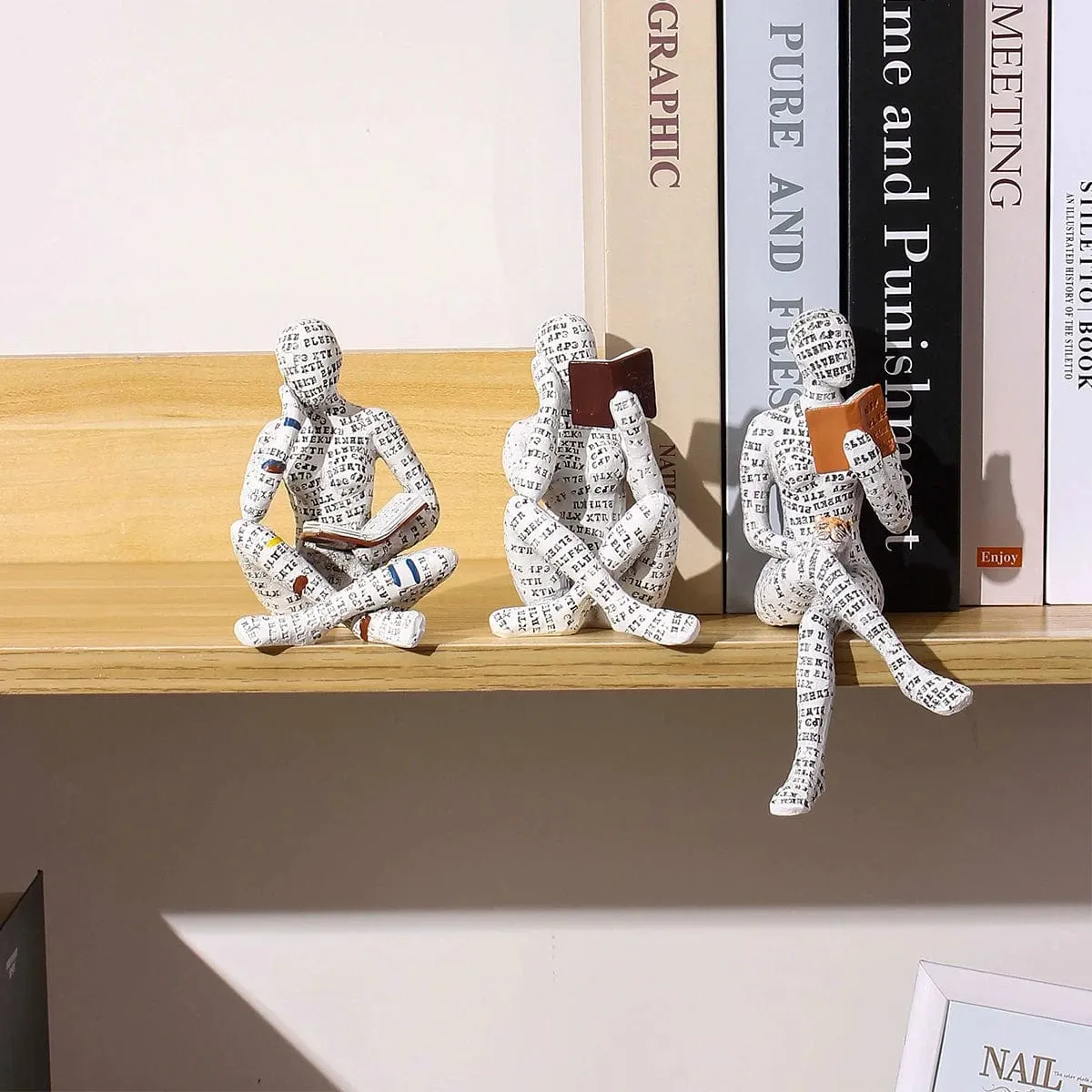 Literary Elegance: Resin Ornaments Featuring a Reading Lady