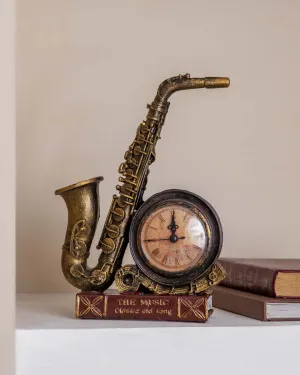 'Saxophone With Clock' Placed On Book Stand